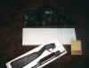 Broken down into it's styrofoam box with original warranty card. It also fits just right in that camo M6 soft case.